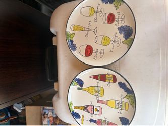Set of pretty wine themed plates.