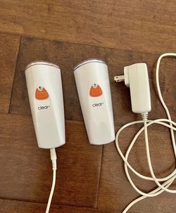 Tanda Clear Plus Red And Blue Light Treatment Devices Comes with two devices and one charger that works for both devices. One has the blue treatme
