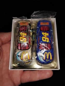 2 racing Champions 1:64 Scale Diecast race cars # 94