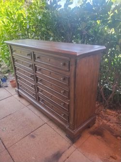 Large Dark Wood Dresser with Multiple Drawers