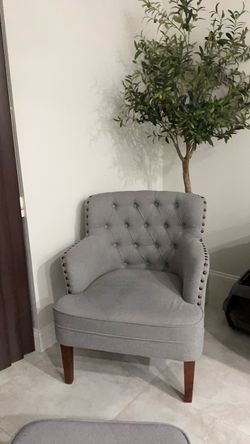 Gray Tufted Accent Chair with Nailhead Trim