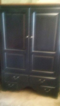 TV Armoire or storage cabinet.