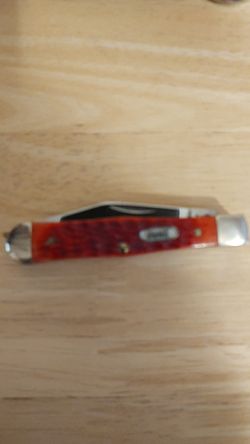 Coca Cola tin with comemerative knife