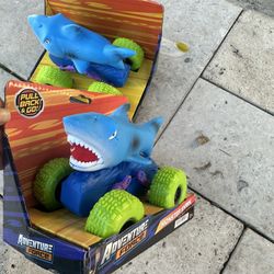 (2) Adventure Force Shark Trucks 
