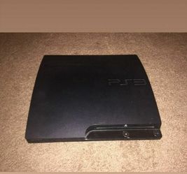 PS3 Slim console with wireless controler and gsmed