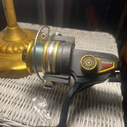  vintage Penn 420 SS spinning reel;