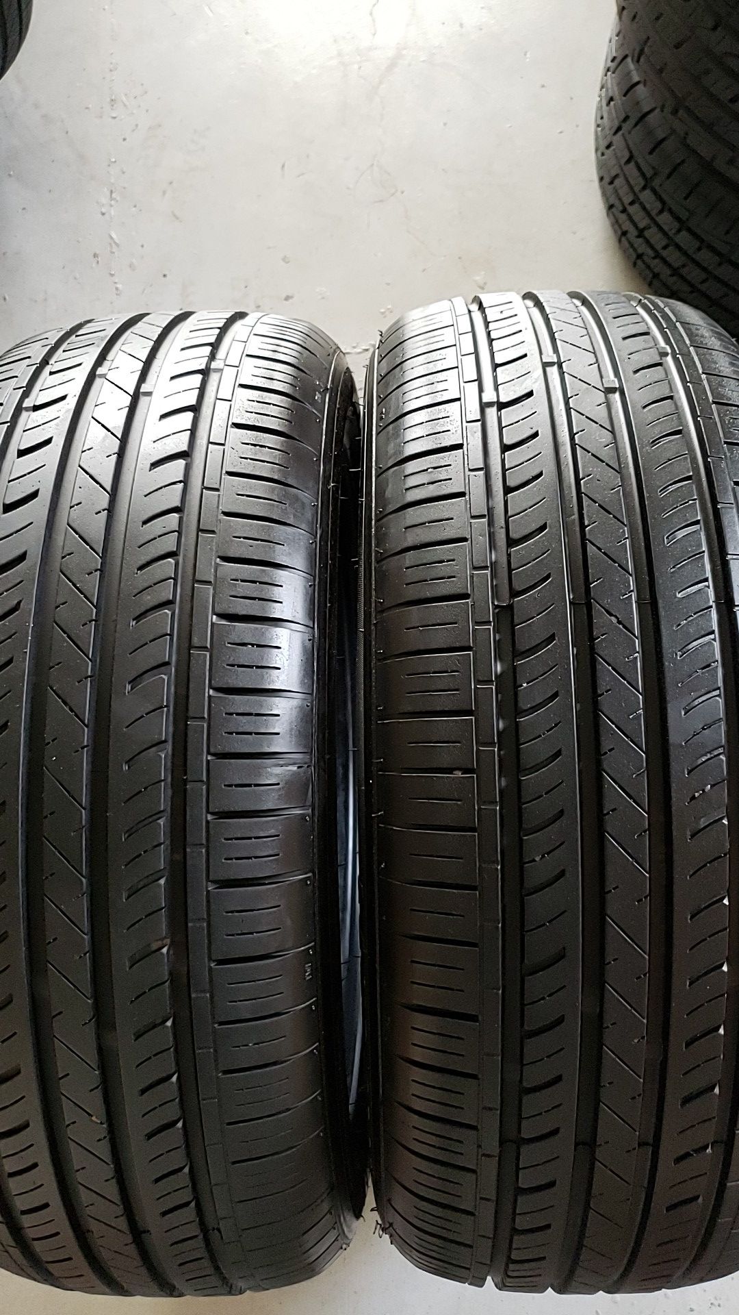 Land sport in great condition 2 tires 215 55 17 80% treated
