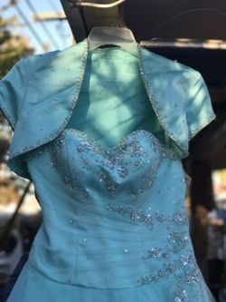 Quinceañera dress Size 12. Color teal (Almost Tiffany blue)