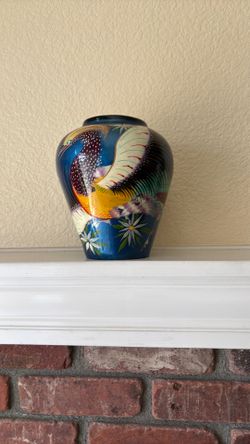Decoration H 7” W 6 “. Opening 3 “