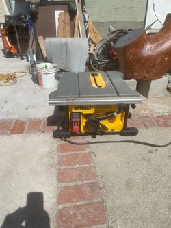 Dewalt table. Saw 8  1/2 8 1/2 like new missing central  real.  $200