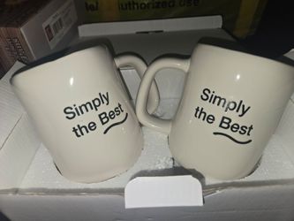 set of two white ceramic 16 oz coffee mugs from the Herbalife Nutrition Home Collection featuring the phrase "Simply the Best" in black text * new