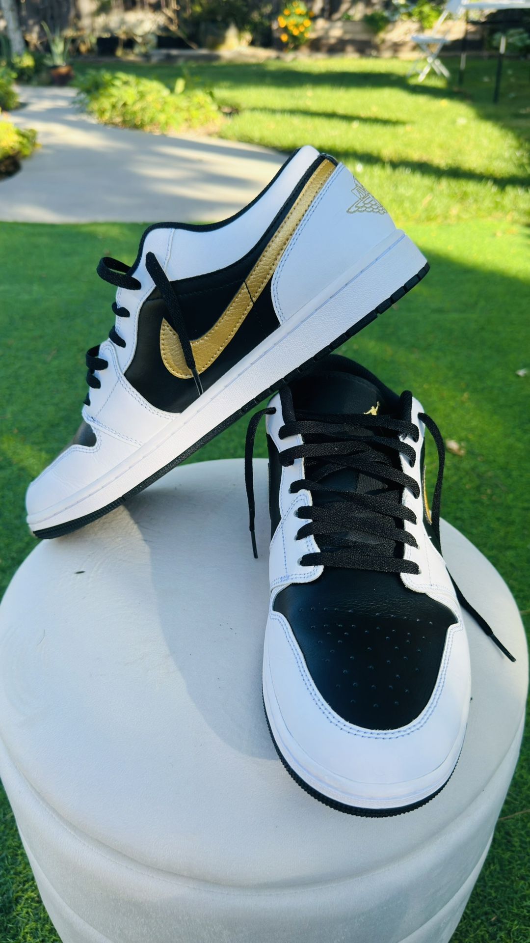 Jordan 1 LowWhite Black Metallic Gold Swoosh