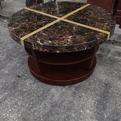 Stone & Wood Style Round Coffee Table With Shelves On Hidden Casters