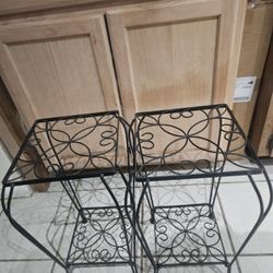 Two decorative iron tables