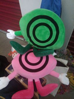 Green and pink EDC pillows from 2026 EDC .