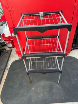 3-compartment metal cabinet measuring 40 inches high, 29 inches wide, and 15 1/2 inches deep
