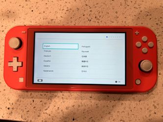 Nintendo Switch Lite Coral – Like New! Includes Charger & Storage Case