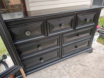 Black dresser with mirror