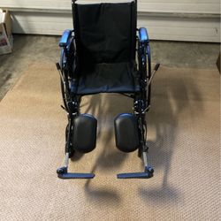 Wheel Chair With Pneumatic  Feet Rest