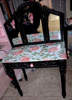 Black vanity with floral detailing customized