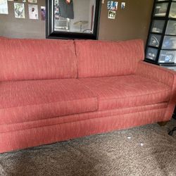 Nice orange couch for sale