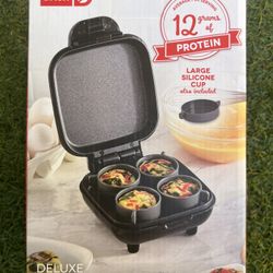 DASH D ЧЕД Open for mare! CHEN HIRAGE PER SERVING 12 ani PROTEIN 4 EGG BITE CUPS also included DELUXE EGG BITE MAKER 1 Egg Sandwich | 4 Egg Bites | 42