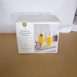 Threshold Hutton Stemless Champagne Glasses. This is a 6-piece set of glassware that is dishwasher safe.