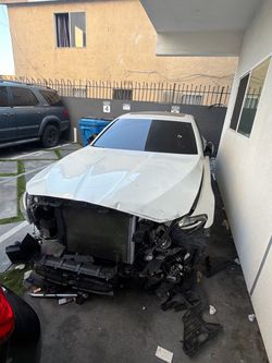 White Sedan Salvage / Parts Car