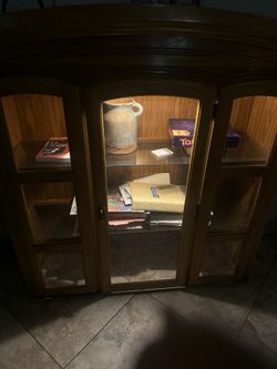 Light up wood cabinet with three glass shelves