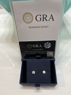 Luxury shine on a budget: 2 Carat Round-Cut GRA-Certified Moissanite studs that hit like diamonds.