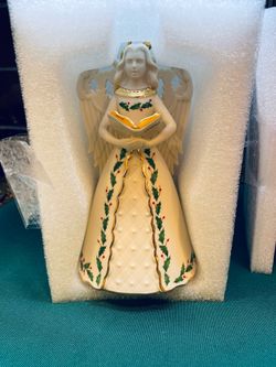 Beautiful Lenox porcelain holiday angel bell ornament with holly accents