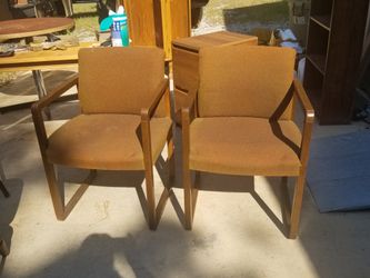 2 office / lobby chairs.  
Chairs are dark green (look brown in the sun). Can be reupholstered