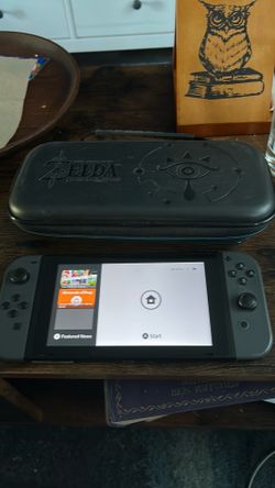 Nintendo switch and 3 Zelda games