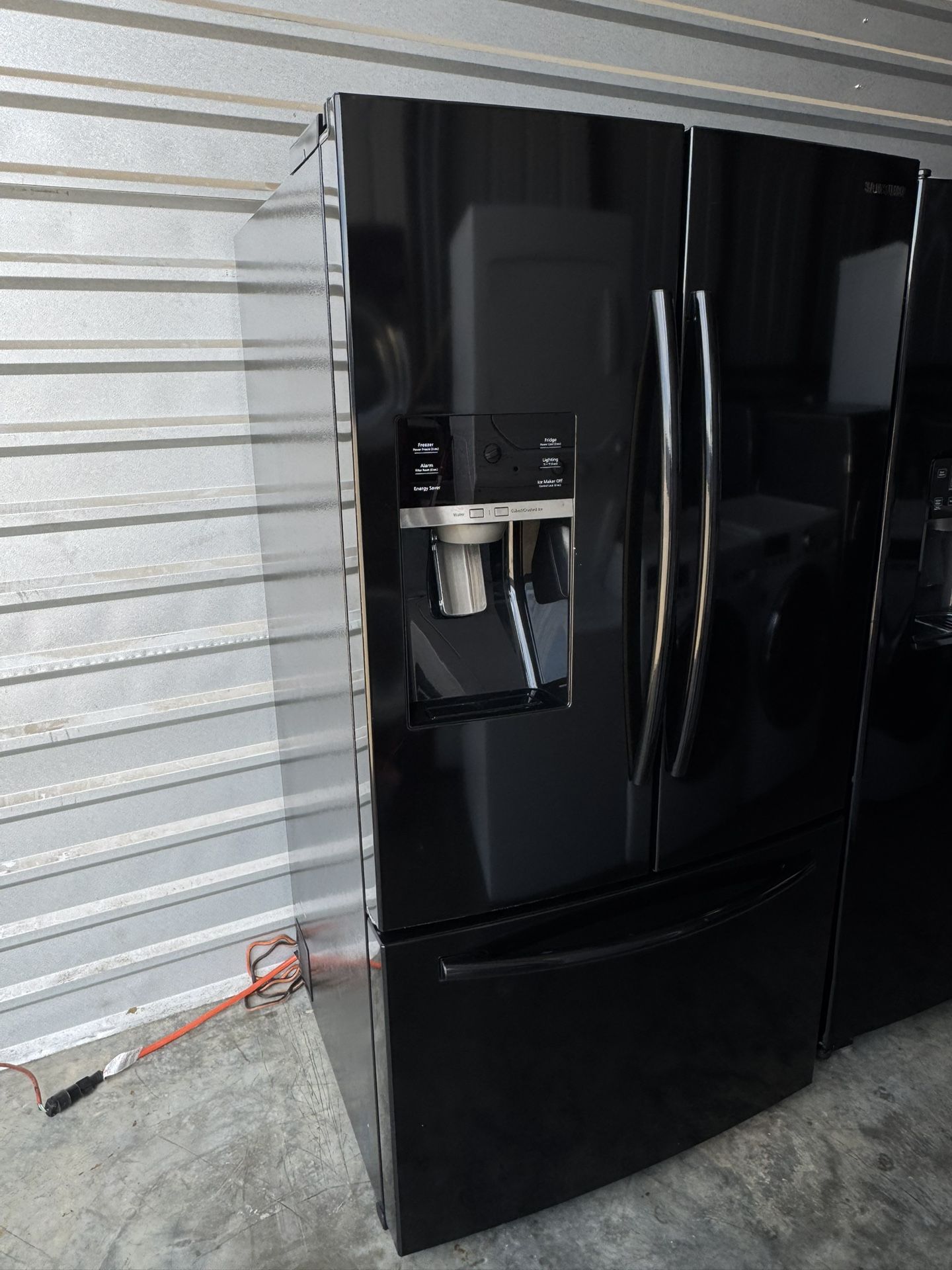 Samsung refrigerator french door  black with 2 ice makers 