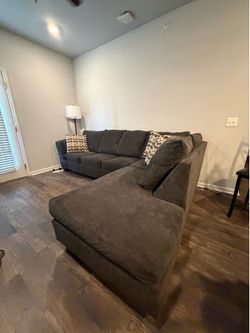 gray l shaped couch read description