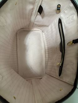 white lv bag pink inside