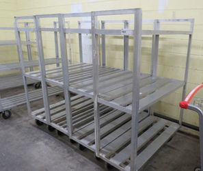 Commercial Aluminum freezer/cooler shelves and Carts shelving without wheels start at $50 with 2 sheves and the ones with wheels start at $150-$200 ea