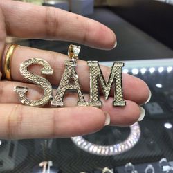 10k Gold Name Plate Pendant With Diamond Cuts Design..