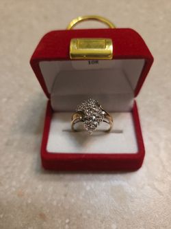 10 k gold diamond ring.  Weight is 3.9 grams