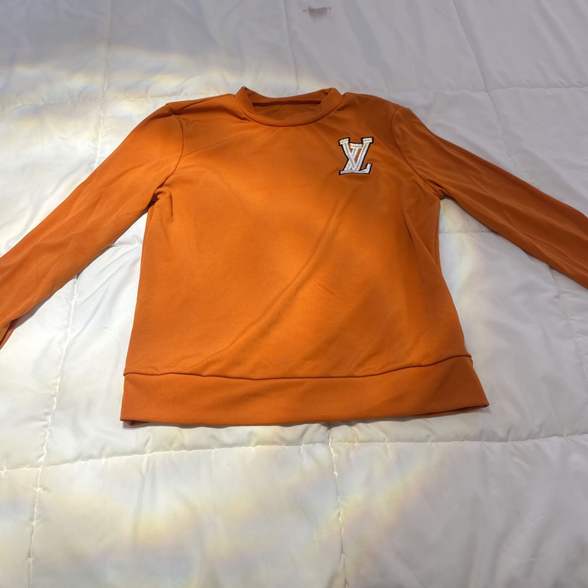 Lv orange top size medium for Sale in Montclair, CA - OfferUp