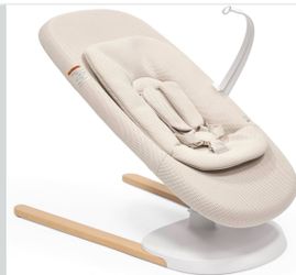 Stokke Yoga Baby Bouncer & Swing, Light Sand - Dual Movement to Soothe & Stimulate Babies Up to 20 lbs - Includes Newborn Cushion for Head Support - T