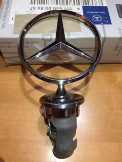 Mercedes original hood emblem part #(contact info hidden)