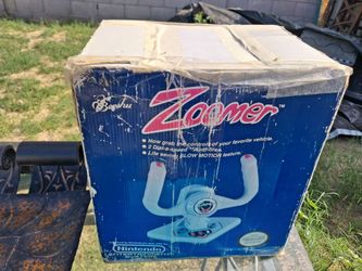 Beeshu Zoomer flight joystick controller for the Nintendo Entertainment System in its original box.