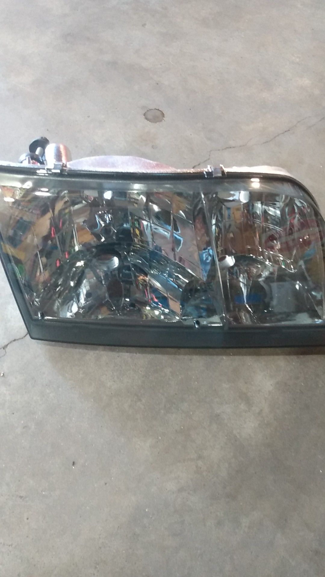 Driver and passenger smoked headlights for a crown Victoria