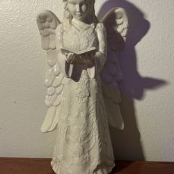 Angel candle stick holder