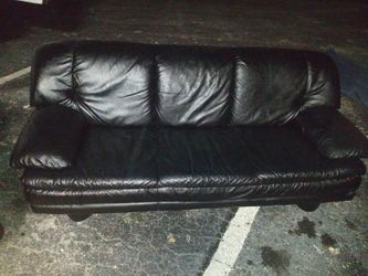 Three piece black leather couch set