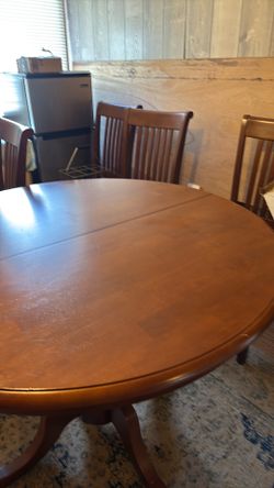 Dining room table with five chairs