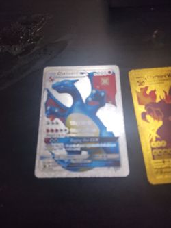 Golden Charizard and silver Charizard and mystery pack