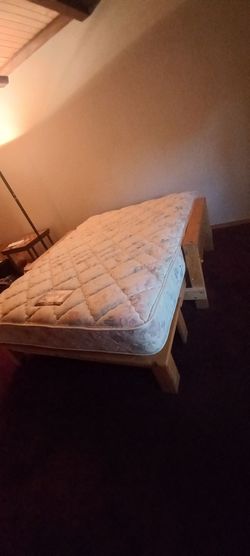 Wooden queen size bed frame and mattress; $100 OBO