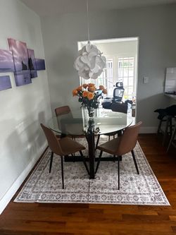 Glass top dining table (chairs not included)